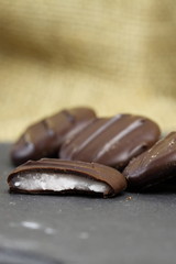 Chocolates cream filling slate / Cream filled chocolates on a slate surface.