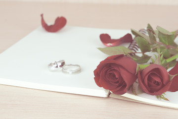Red roses and rings gift for Valentine's Day