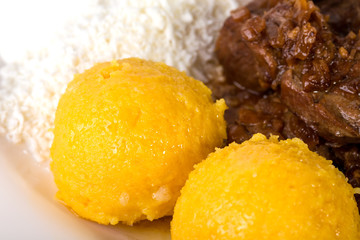 Traditional maize porridge with pork meat.