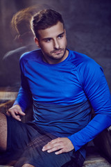Fototapeta premium A man in shorts and blue sport jersey.