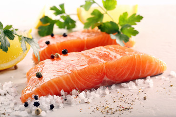 Fresh raw salmon fillet and aromatic spices for baking