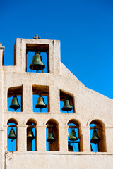 Fototapeta na wymiar in cyclades greece a cross the and bell