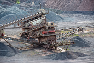 stone crusher in porphyry surface mine. hdr image