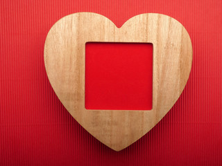 Wooden picture frame. Background Valentines Day.