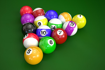 Billiard balls on green background