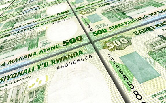 Rwandan francs bills stacked background. Computer generated 3D photo rendering.