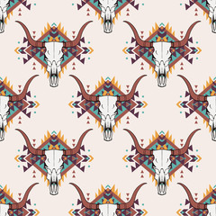 Vector tribal seamless pattern with bull skull and decorative ethnic ornament. Boho style. American indian motifs.