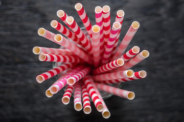 Striped red and pink straws - Powered by Adobe