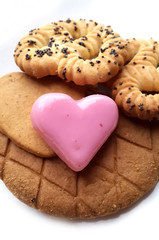 Sweet red marzipan heart and Crunchy fresh biscuits