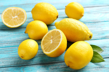 Fototapeta na wymiar Lemon fruits on a blue wooden table