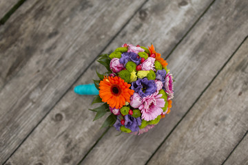bridal bouquet on a wood table