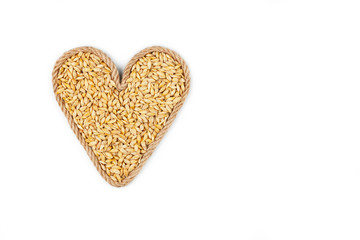 Symbolic heart made from rope with barley grains