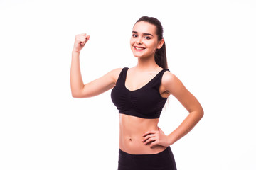 Fototapeta na wymiar Portrait of beautiful young sporty muscular woman. Isolated over white background