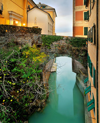 bridge over the canal and traditional italian scene