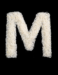 White rice grain alphabet letter m