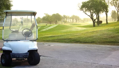 Foto auf Acrylglas Golf Golf car on the golf course