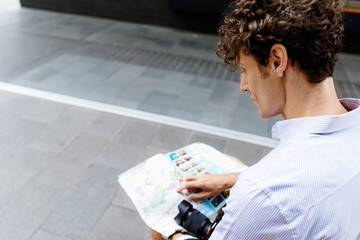 Male tourist in city