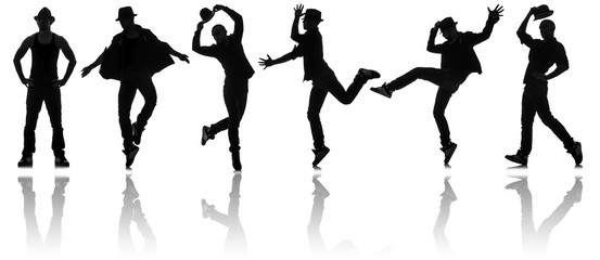 Silhouettes of dancers in dancing concept