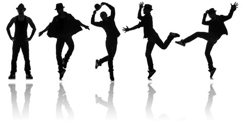 Silhouettes of dancers in dancing concept
