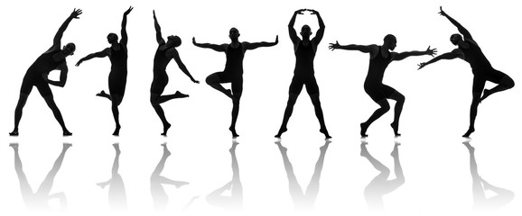 Silhouettes of dancers in dancing concept