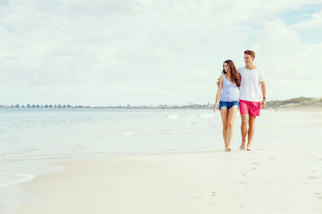 Romantic young couple on the beach