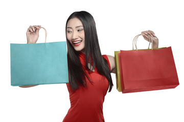 Chinese woman holding shopping bag