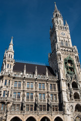 Fototapeta na wymiar Munich town hall detail in the sun against blue sky