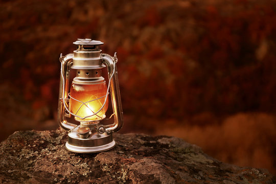 Fototapeta Decorative lamp on rock in mountains