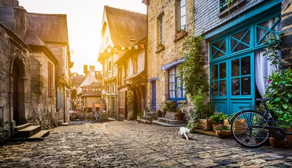 Fotobehang Old town in Europe at sunset with retro vintage Instagram style filter and lens flare effect © JFL Photography