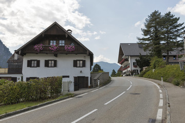 Fototapeta na wymiar Road through Alpine village in Austria