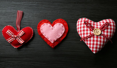 Beautiful romantic hearts on wooden background