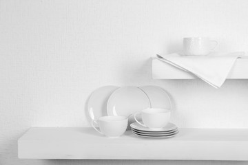 Tableware with napkin on a white background