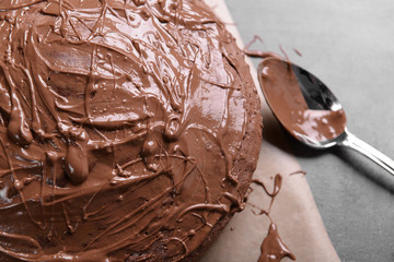 Chocolate pie with spoon, closeup