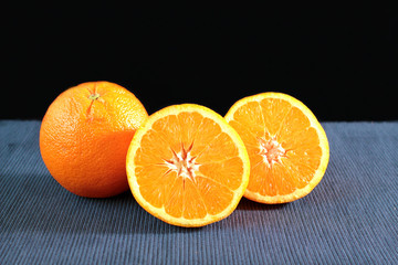 Fresh oranges with black background