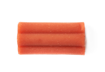 Red licorice stick candy isolated