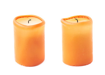 Burned orange candle isolated