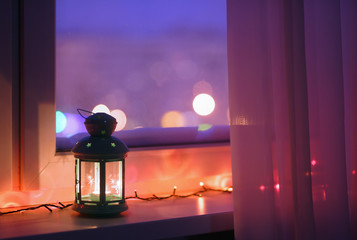 Lantern on a window sill