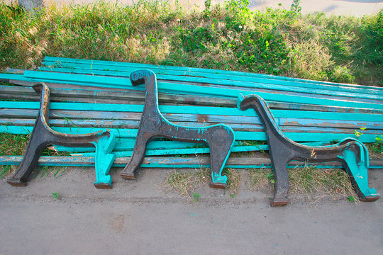 Disassembled for restoration shops lying on the grass in the par
