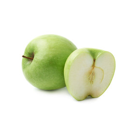 Green apple next to a slice isolated