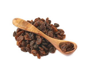Wooden spoon over the pile of raisins