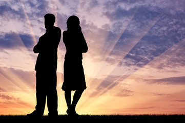 Silhouette of man and woman in a quarrel