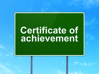 Education concept: Certificate of Achievement on road sign background