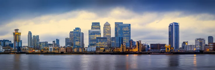 Panoramic skyline of Canary Wharf, the worlds leading financial district at blue hour - London, UK © zgphotography