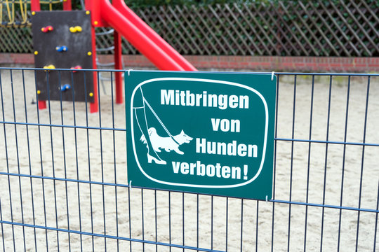 no dogs / Playground and sign with the german words Dogs are not allowed