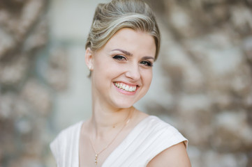 Beautiful bride with bouquet before wedding ceremony