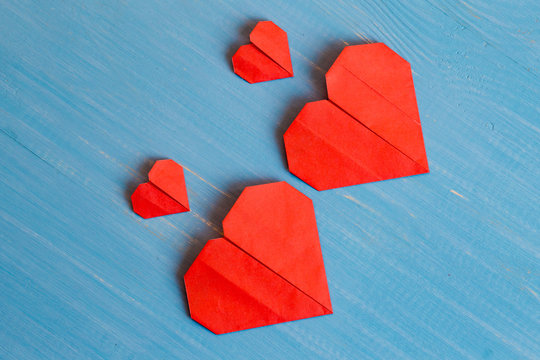 Family prepared for Valentine's Day. Origami of heart. Concept. 