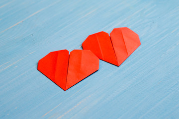 Family prepared for Valentine's Day. Origami of heart. Concept. 