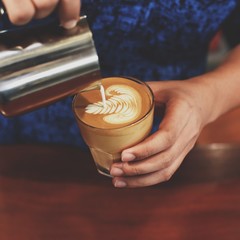 cup of coffee on the wooden desk