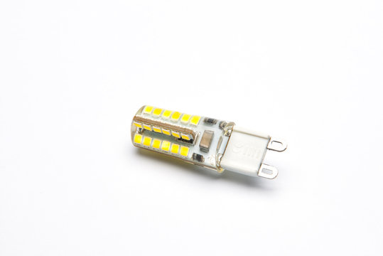 LED Energy saving lamp g9 on white background