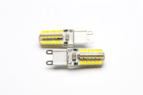 LED Energy saving lamp g9 on white background